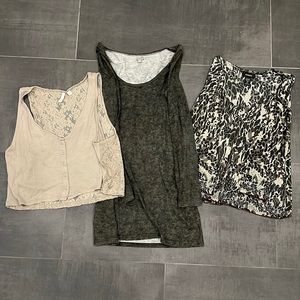 Bundle of women’s extra large shirts.